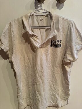 American Eagle Outfitters Cream Polo with Navy Chest Numbers